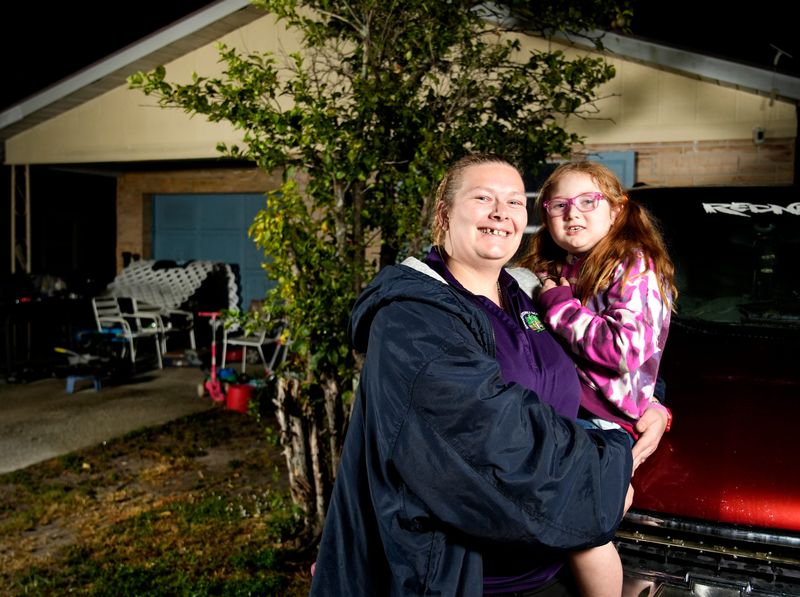 Candace Choate and her daughter, Trinity, 6, at their home in Sarasota.