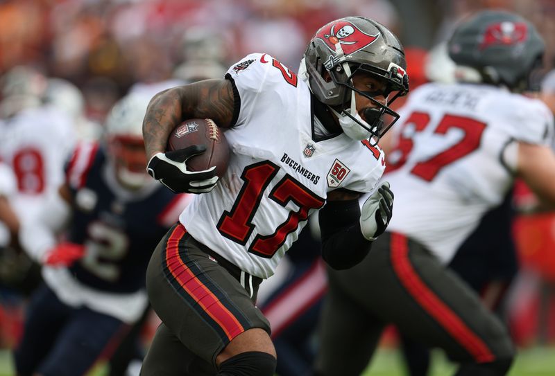 Nov 9, 2025; Tampa, Florida, USA; Tampa Bay Buccaneers wide receiver Sterling Shepard (17) runs for a gain against the New England Patriots at Raymond James Stadium. Mandatory Credit: Nathan Ray Seebeck-Imagn Images