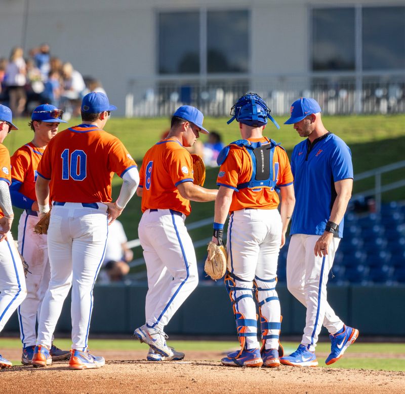 Florida pitching coach David Kopp calls for a new pitcher during Game 1 against Georgia Southern, Sunday, November 9, 2025, at Condron Family Ballpark in Gainesville, Florida. Florida won the first game 8-2. [Cyndi Chambers/ Gainesville Sun] 2025