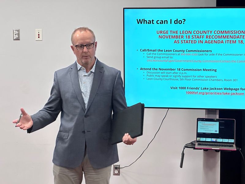 Gary Hunter, a Tallahassee attorney who represents landowner Jeff Phipps, speaks with residents about proposed Comp Plan changes that would bring more development on Phipps-owned land around the Lake Jackson aquatic preserve during a meeting Nov. 13, 2025, at the Northside Community Center.
