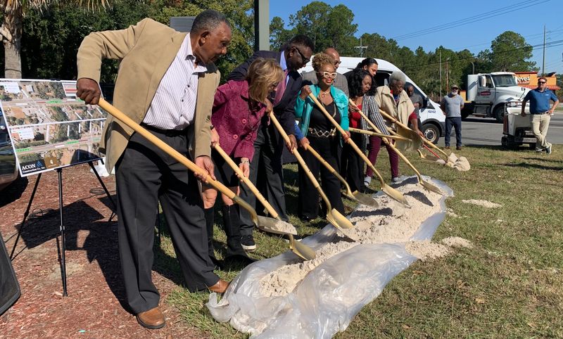 Jacksonville City Council member Ju'Coby Pittman, fourth from left, joined city officials and neighborhood leaders at a Nov. 14, 2025 groundbreaking ceremony for upcoming work along a 2.2 mile stretch of New Kings Road. Improvements will include landscaped medians with new oak trees and pavers in the first phase of construction.