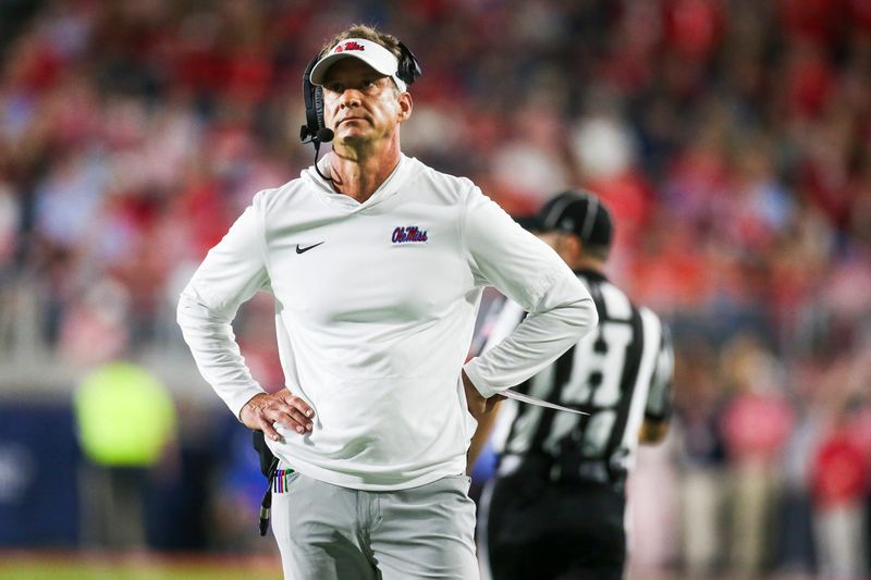 Nov 15, 2025; Oxford, Mississippi, USA; Mississippi Rebels head coach Lane Kiffin stands on the sideline during the first quarter against the Florida Gators at Vaught-Hemingway Stadium. Mandatory Credit: Petre Thomas-Imagn Images
