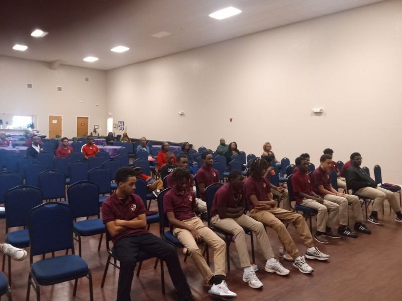 Local youth who are members of the Kappa League, a mentoring program sponsored by the Gainesville Alumni Chapter of Kappa Alpha Psi Fraternity Inc., attend the "Gangs, Guns and Grades" youth summit sponsored by the fraternity.