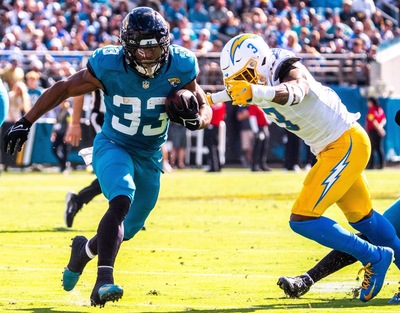 Jacksonville Jaguars running back Bhayshul Tuten (33) finds a hole during the first quarter in an NFL football game at EverBank Stadium, Sunday, November 16, 2025, in Jacksonville, Fla. [Doug Engle/Florida Times-Union]