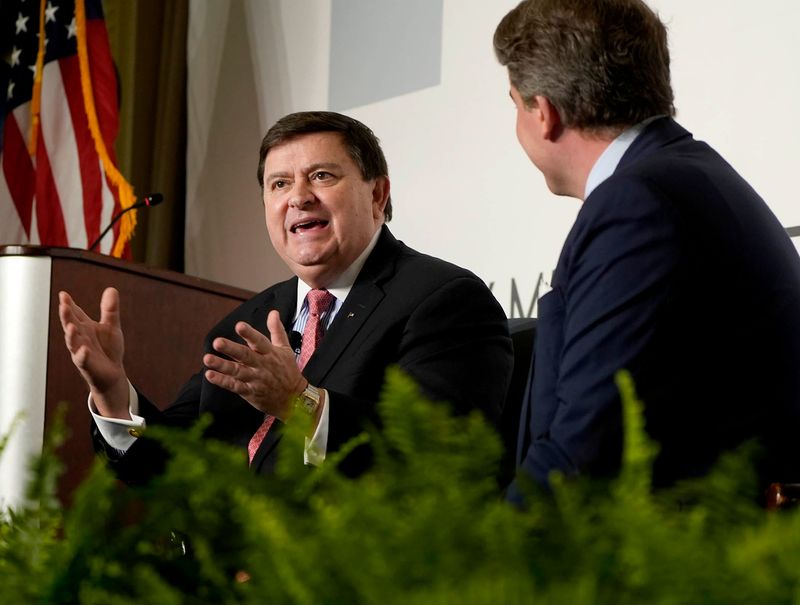 Matthew Swift (right) moderates a conversation with White House Historical Association President Stewart McLaurin during the Palm Beach Chamber of Commerce's monthly breakfast meeting on Nov. 18 at The Breakers.