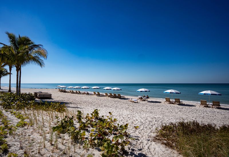Scenes from a ribbon cutting ceremony at the Naples Beach Club, a Four Seasons Resort, in Naples, Fla., on Tuesday, Nov. 18, 2025.