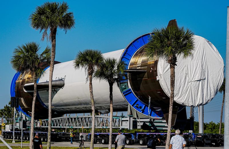A Blue Origin New Glenn booster named “Never tell me the Odds” is transported back to the launch facility at Cape Canaveral Space Force Station November 20, 2025. Craig Bailey, FLORIDA TODAY via USA TODAY NETWORK