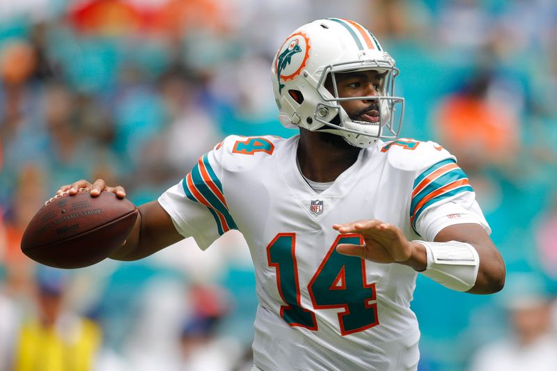 Oct 3, 2021; Miami Gardens, Florida, USA; Miami Dolphins quarterback Jacoby Brissett (14) throws a pass during the first quarter of the game against the Indianapolis Colts at Hard Rock Stadium. Mandatory Credit: Sam Navarro-USA TODAY Sports