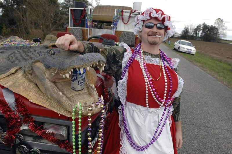 Mrs. Claus (John Pugh) poses for a photo before the Redneck Christmas Parade in Chumuckla in 2010.