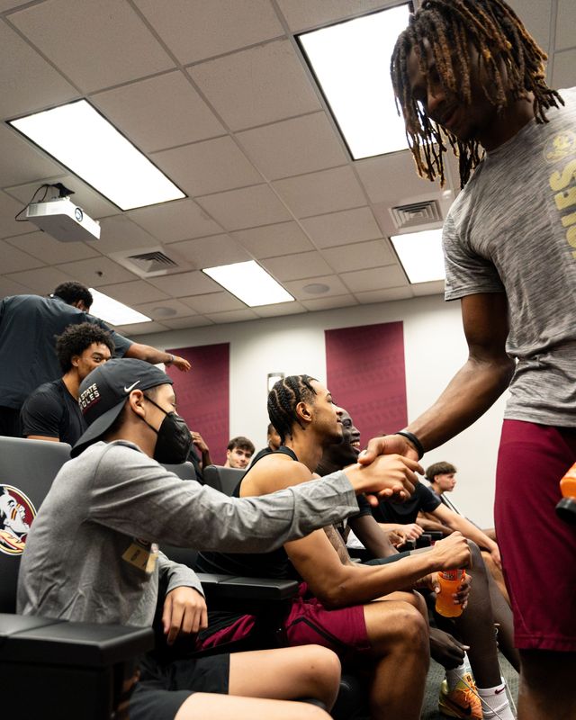 FSU men's basketball played AJ Swinton shakes hands with Trace Thompson on Wednesday Nov. 19