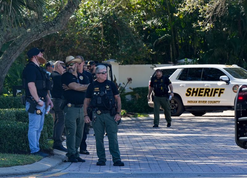 Indian River County Sheriff’s deputies stand outside of the Bermuda Club Somerset Bay community where Terri Mashkow, 47, with 25 years of service, died in the line of duty, Nov. 21, 2025, in Vero Beach.