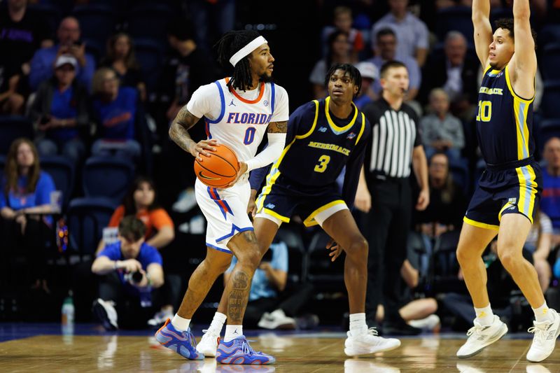 Nov 21, 2025; Gainesville, Florida, USA; Florida Gators guard Boogie Fland (0) looks to pass while Merrimack Warriors guard Andres Marrero (10) defends during the first half at Exactech Arena at the Stephen C. O'Connell Center. Mandatory Credit: Matt Pendleton-Imagn Images