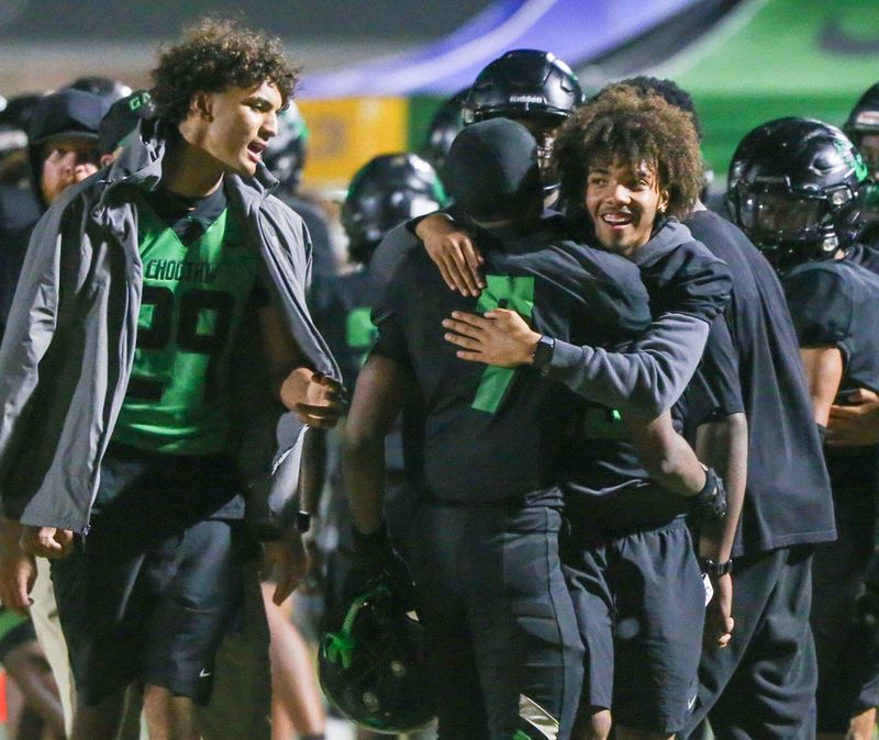 Choctaw DB Amir Reese is hugged after a fourth quarter pick-six gave the Indians the lead against Columbia during their District 4A Regional semifinal football game at Choctaw. The Indians advanced to the regional final with a 27-20 win.