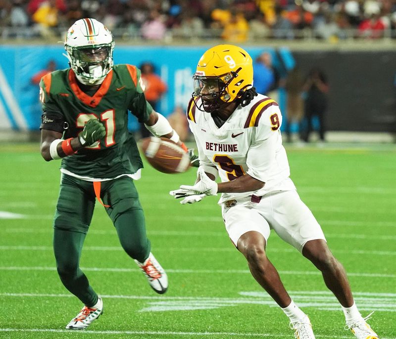 Bethune-Cookman's Maleek Huggins (9) catches the ball down the field against Florida A&M during the Florida Classic, Saturday, Nov. 22, 2025, at Camping World Stadium in Orlando.