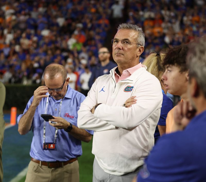 Former Florida football Coach Urban Meyer watches the action during the first half of an NCAA football game against Tennessee at Steve Spurrier Field at Ben Hill Griffin Stadium in Gainesville, FL on Saturday, November 22, 2025. [Alan Youngblood/Gainesville Sun]