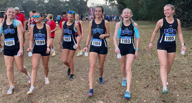 The Lakeland girls team, led by by Emma Wilkinson, second from right, finished 10th as a team in the 1A girls race.