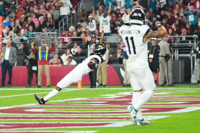 Nov 23, 2025; Glendale, Arizona, USA; Jacksonville Jaguars wide receiver Jakobi Meyers (3) celebrates after scoring a touchdown during the third quarter against the Arizona Cardinals at State Farm Stadium. Mandatory Credit: Joe Camporeale-Imagn Images