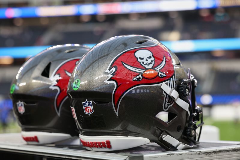 Nov 23, 2025; Inglewood, California, USA; Tampa Bay Buccaneers football helmets are seen on the sideline before the game against the Los Angeles Rams at SoFi Stadium. Mandatory Credit: Kiyoshi Mio-Imagn Images
