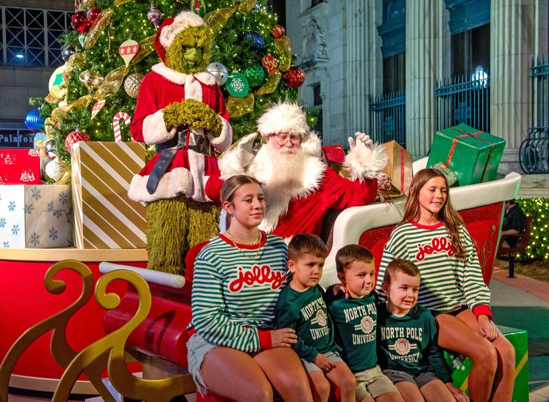Families get their photo with Sanat during Winterfest in Downtown Pensacola Sunday, Nov. 23, 2025.