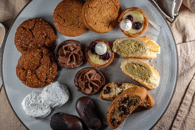 Oceano's cookies & confections plate includes lemon tartlets, oatmeal cream pies, peanut butter-chocolate sandwich cookie, devil dogs, brownie bites and Dubai chocolate. Oceano is one of USA TODAY's acclaimed Restaurants of the Year.