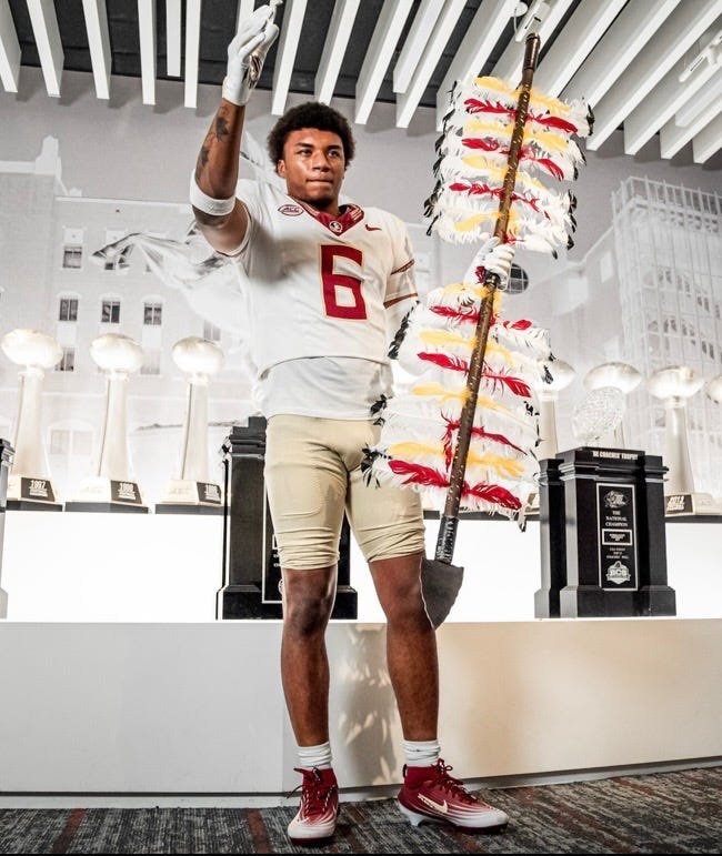 Tavares senior linebacker Izayia Williams poses during his official visit to Florida State.