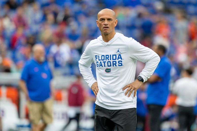 Nov 29, 2025; Gainesville, Florida, USA; Florida Gators interim head coach Billy Gonzales during warmups before a football game against the Florida State Seminoles at Ben Hill Griffin Stadium. Mandatory Credit: Bob Kupbens-Imagn Images
