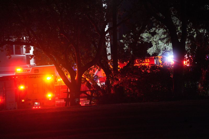 A large number of emergency officials and law enforcement are gathered at the Cape Coral Yacht Club investigating a boat crash in the Caloosahatchee River on Saturday, Nov. 29, 2025.