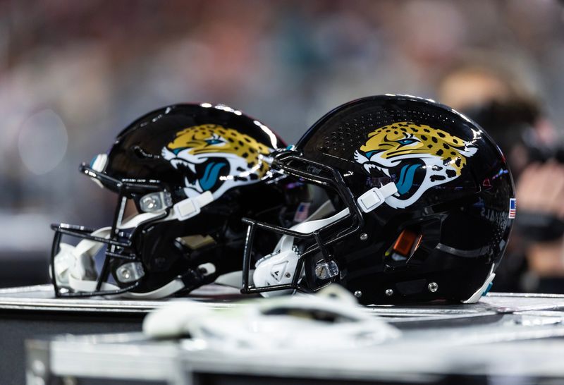 Nov 23, 2025; Glendale, Arizona, USA; Detailed view of a Jacksonville Jaguars helmet at State Farm Stadium. Mandatory Credit: Mark J. Rebilas-Imagn Images