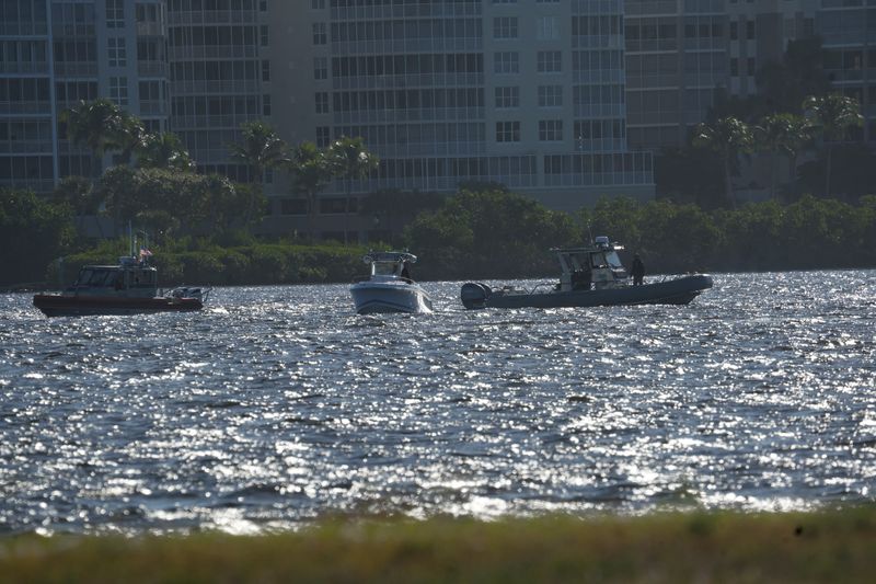 Emergency Officials work the scene of boat crash in the Caloosahatchee River on Sunday, Nov. 30, 2025.