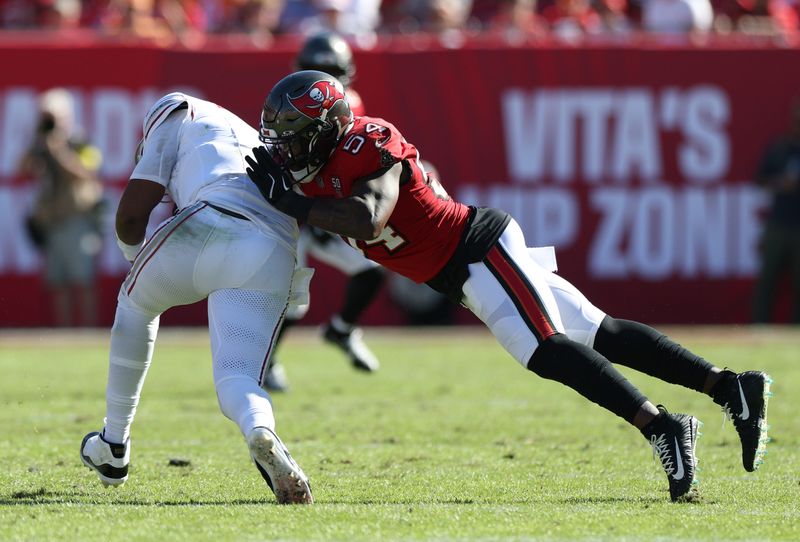 Nov 30, 2025; Tampa, Florida, USA; Tampa Bay Buccaneers linebacker Lavonte David (54) tackles Arizona Cardinals quarterback Jacoby Brissett (7) during the first half at Raymond James Stadium. Mandatory Credit: Nathan Ray Seebeck-Imagn Images