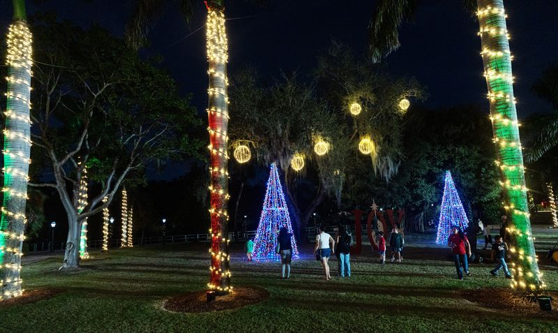 People enjoy Holiday in the Park 2025 at Riverside Park in Bonita Springs on Tuesday, Dec. 2, 2025. This is one of the kickoff events for the Christmas season. The park will also host the Holiday Stroll display which is featured througout the rest of the month.
