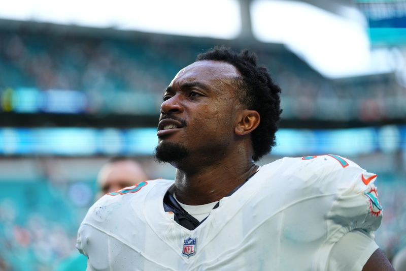 Nov 30, 2025; Miami Gardens, Florida, USA; Miami Dolphins guard Austin Jackson (73) leaves the field following a game against the New Orleans Saints at Hard Rock Stadium. Mandatory Credit: Rich Storry-Imagn Images