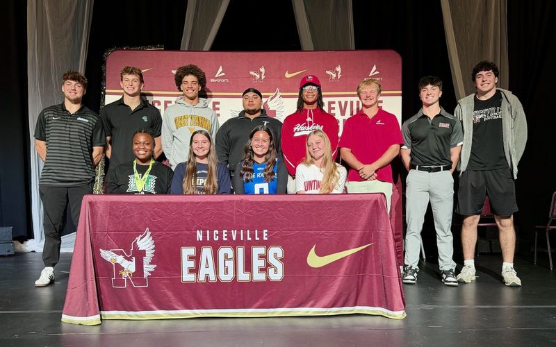 Niceville's National Signing Day crew included 11 signees, while Max Roche (far right) is undecided.