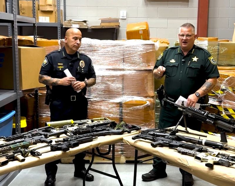 Palm Bay Police Chief Mario Augello and Brevard County Sheriff Wayne Ivey discuss the seizure of weapons along with 92,000 pounds of the now illegal substance 7-OH in a Dec. 3 raid.