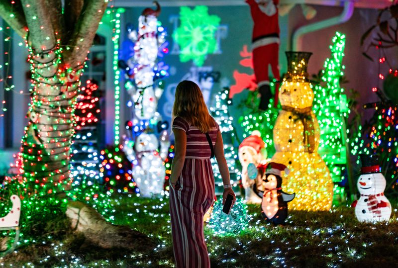 Holiday displays are lit up along the 1900 block of Sheffield Avenue on Marco Island, Fla., on Thursday, Dec. 4, 2025.