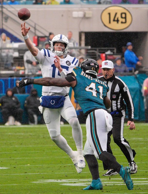 Jacksonville Jaguars defensive end Josh Hines-Allen (41) pressures Indianapolis Colts quarterback Riley Leonard (15) in the second quarter during an NFL football game at EverBank Stadium, Sunday, Dec. 7, 2025, in Jacksonville, Fla. [Doug Engle/Florida Times-Union]