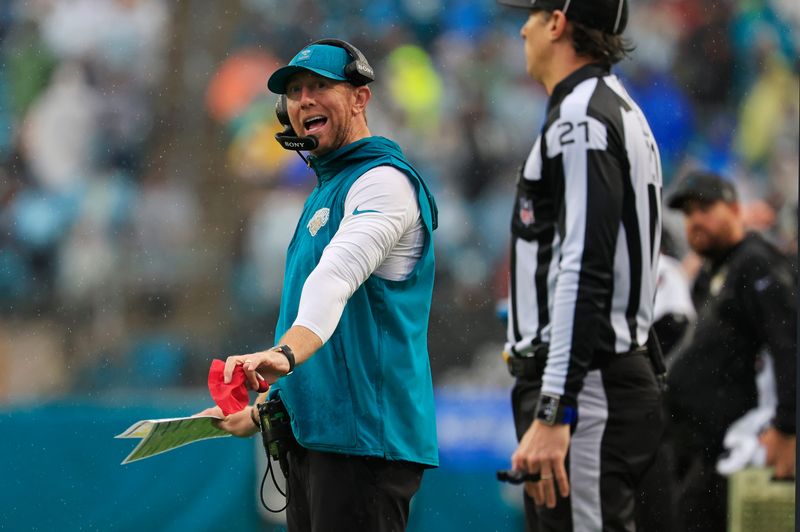 Jacksonville Jaguars head coach Liam Coen challenges the spot of the down during the fourth quarter of an NFL football game at EverBank Stadium, Sunday, Dec. 7, 2025, in Jacksonville, Fla. The Jaguars defeated the Colts 36-19. [Corey Perrine/Florida Times-Union]