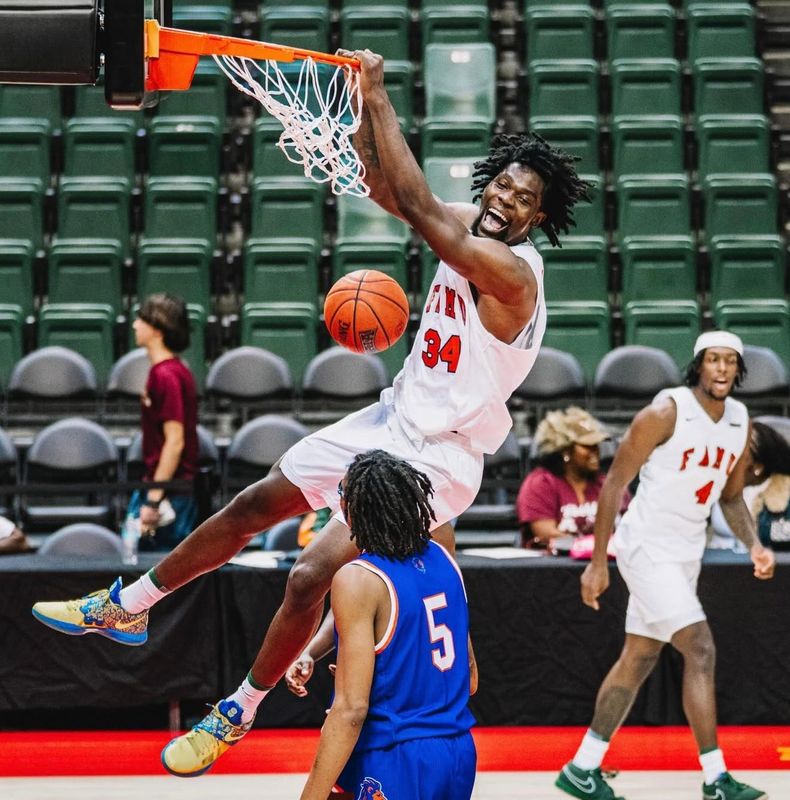 Florida A&M Rattlers center Miles Ndalama jams it home during the HBCU Hoops Invitational basketball game versus Florida Memorial at the ESPN Wide World of Sports in Orlando, Florida, Saturday, Dec. 6, 2025.