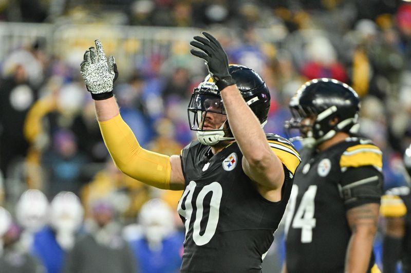 Nov 30, 2025; Pittsburgh, Pennsylvania, USA; Pittsburgh Steelers linebacker T.J. Watt (90) reacts against the Buffalo Bills during the first half at Acrisure Stadium. Mandatory Credit: Barry Reeger-Imagn Images