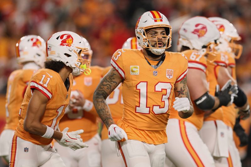 Dec 11, 2025; Tampa, Florida, USA; Tampa Bay Buccaneers wide receiver Mike Evans (13) runs to the line of scrimmage before a play against the Atlanta Falcons during the first quarter at Raymond James Stadium. Mandatory Credit: Nathan Ray Seebeck-Imagn Images
