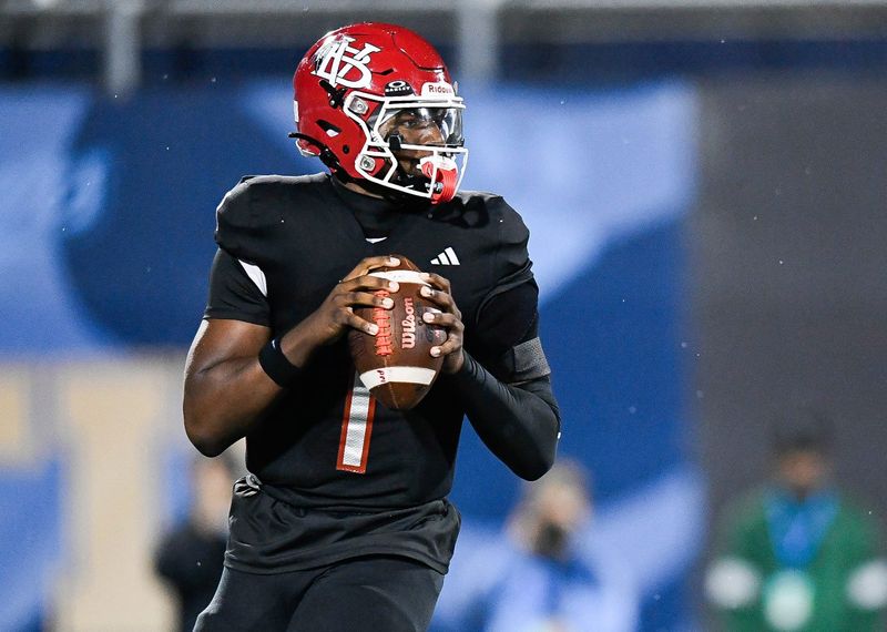 Champ Monds (1) of Vero Beach looks to pass in the FHSAA Class 7A state championship, Dec. 13, 2025, at Pitbull Stadium in Miami.