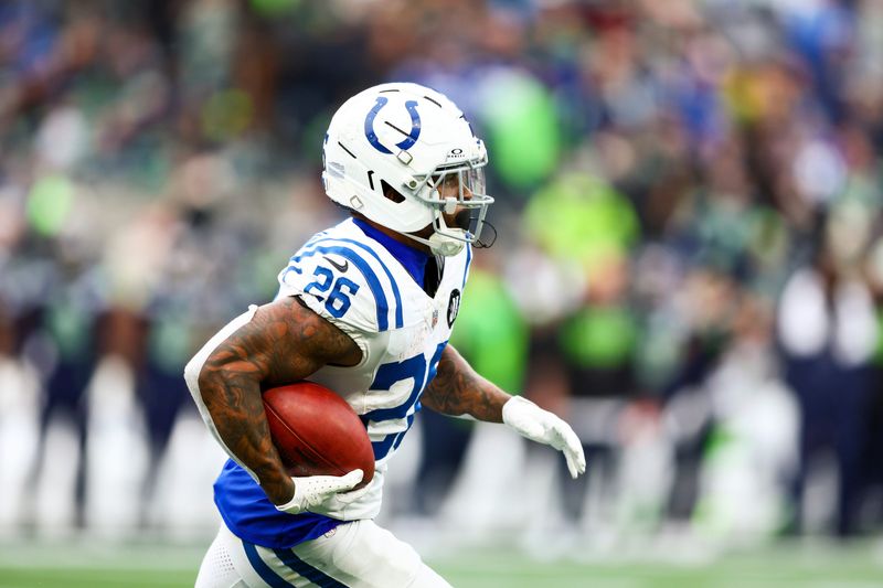Dec 14, 2025; Seattle, Washington, USA; Indianapolis Colts running back Ameer Abdullah (26) returns a punt against the Seattle Seahawks during the third quarter at Lumen Field. Mandatory Credit: Kevin Ng-Imagn Images