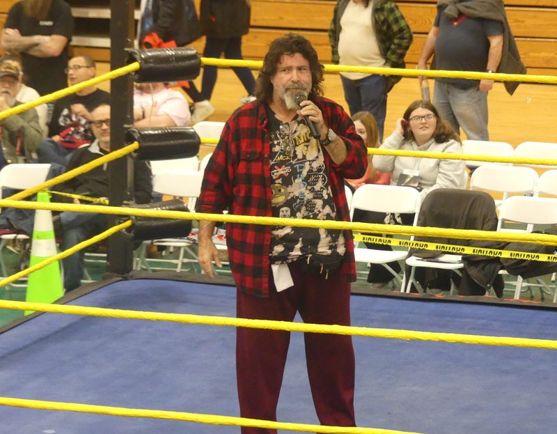 Mick Foley answered fan questions while in the ring.