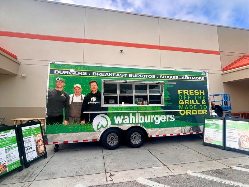 A food truck for Wahlburgers is selling its burgers, shakes and breakfast burritos in front of the Home Depot in Stuart.