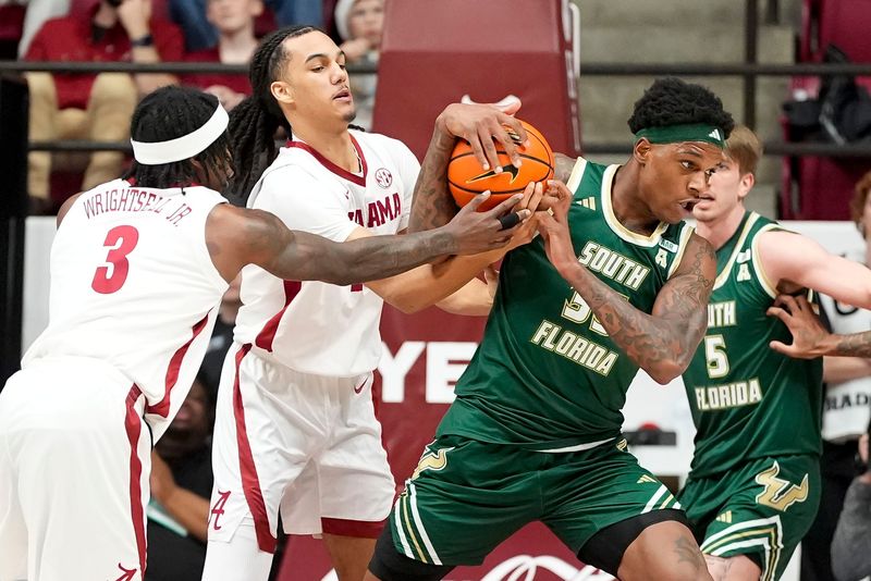 Dec 17, 2025; Tuscaloosa, AL, USA; Alabama guard Latrell Wrightsell Jr. (3) and Alabama forward Keitenn Bristow (10) lose a rebound battle with South Florida forward Izaiyah Nelson (35) at Coleman Coliseum. Mandatory Credit: Gary Cosby Jr.-Tuscaloosa News