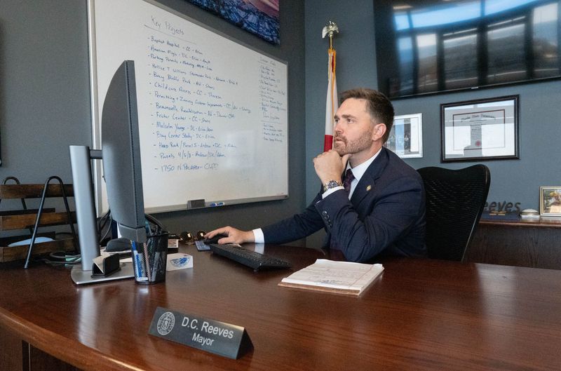 Mayor D.C. Reeves works in his office at City Hall in Pensacola on Dec. 19, 2025.
