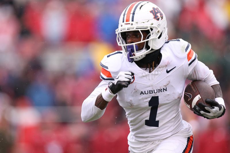 FAYETTEVILLE, AR - OCTOBER 25 - Auburn wide receiver Eric Singleton Jr. (1) - Auburn Tigers vs. Arkansas Razorbacks at Donald W. Reynolds Razorback Stadium in Fayetteville, AR on Saturday, Oct. 25, 2025.