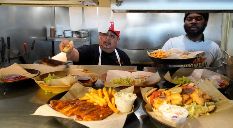 The kitchen staff at Tide Tables serves up fresh seafood. Tide Tables Restaurant and Marina in Bradenton, Florida has been named one of USA TODAY’s best restaurants of 2026.