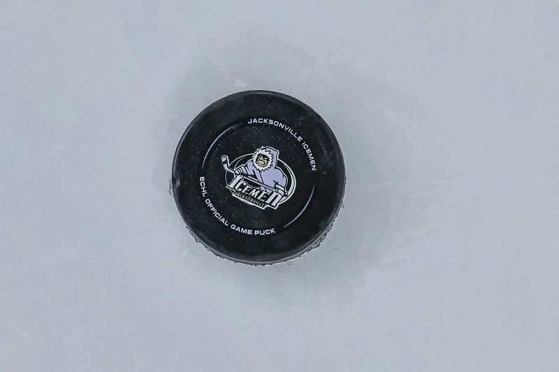 An official puck awaits a faceoff between the Jacksonville Icemen and the Orlando Solar Bears during an ECHL hockey game at Veterans Memorial Arena in Jacksonville, Fla., Wednesday, Dec. 17, 2025. [Gary Lloyd McCullough/Provided by the Jacksonville Icemen]