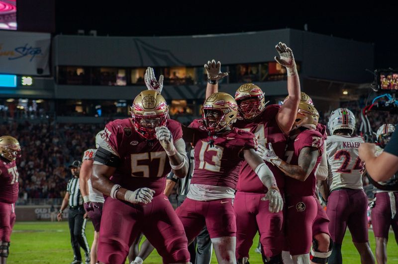 Junior tight end Randy Pittman celebrates a score alongisde senior offensive lineman Micah Pettus in FSU's matchup against Virginia Tech on Nov. 15.